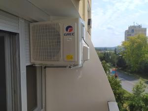 an air conditioner on the side of a building at Krénusz Vendégház 2. in Kaposvár
