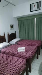 Una cama o camas en una habitación de Hotel Atlântico Avenida