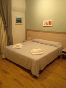 Postel nebo postele na pokoji v ubytování B&B delle murge
