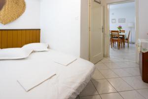Posteľ alebo postele v izbe v ubytovaní Apartmani Vranjes