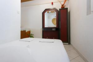 Posteľ alebo postele v izbe v ubytovaní Apartmani Vranjes