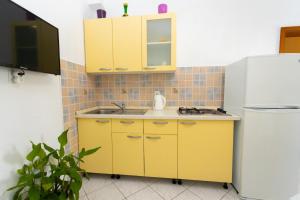 Kuchyňa alebo kuchynka v ubytovaní Apartmani Vranjes