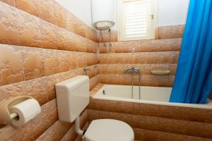 Kúpeľňa v ubytovaní Apartmani Vranjes 2 + 25 fotografií