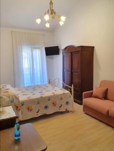 TV a/nebo společenská místnost v ubytování Relax da Giusy