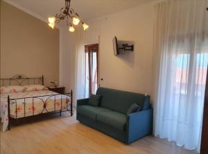 Postel nebo postele na pokoji v ubytování Relax da Giusy