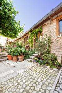 Ogród w obiekcie B&B BONE NOVELLE dimora storica palazzo zuzi