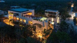 an aerial view of a house at night at Unho Tulum in Tulum