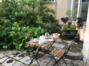 Zahrada ubytování Maison d'hôtes de Charme + 10 fotografií