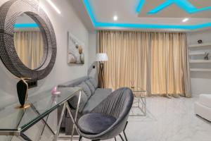 A seating area at Rua Mat - Serene Villas with Modern Comfort, by ZanteWize