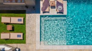 The swimming pool at or close to Rua Mat - Serene Villas with Modern Comfort, by ZanteWize