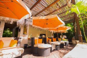Coin salon dans l'établissement Villa del Palmar Cancun Luxury Beach Resort & Spa