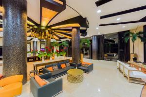 Coin salon dans l'établissement Villa del Palmar Cancun Luxury Beach Resort & Spa