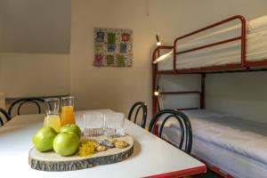 A bed or beds in a room at Aparthotel Claviere