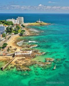 an aerial view of a beach and the ocean at MarAzul Residence in Salvador