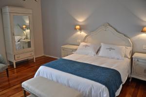 Postel nebo postele na pokoji v ubytování Hotel Rural La Raposera