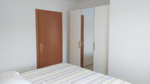 Ein Bett oder Betten in einem Zimmer der Unterkunft APARTMAN KARLA