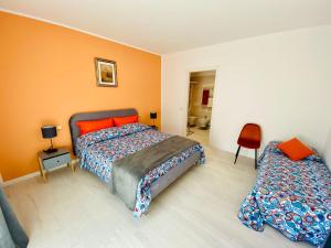 Posteľ alebo postele v izbe v ubytovaní I Broletti del Garda