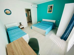 Posteľ alebo postele v izbe v ubytovaní I Broletti del Garda
