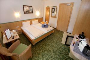 Łóżko lub łóżka w pokoju w obiekcie Hotel Eder Michaela