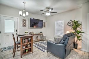 a living room with a couch and a table at Edinburg Apartment Close to Dtwn Shopping! in Edinburg