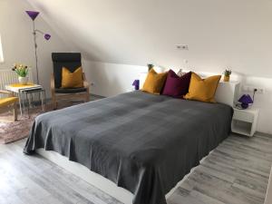 Ένα ή περισσότερα κρεβάτια σε δωμάτιο στο Dominik Apartmanház