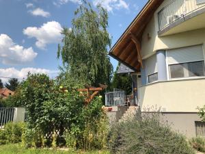 Zahrada ubytování Dominik Apartmanház