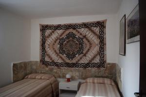 Postel nebo postele na pokoji v ubytování Villa Ina