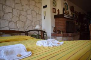 Postel nebo postele na pokoji v ubytování Villa Ina