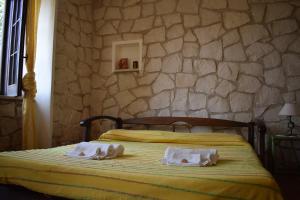 Postel nebo postele na pokoji v ubytování Villa Ina + 37 fotografií