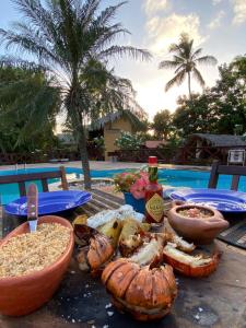 The swimming pool at or close to Pousada Rota dos Ventos