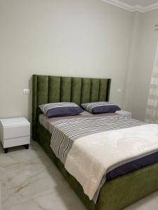 Katil atau katil-katil dalam bilik di Frenki'S Residence