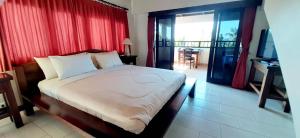 Llit o llits en una habitació de Istana Balian - Boutique Hotel Resort