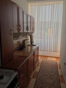 Kuchyň nebo kuchyňský kout v ubytování City rooms