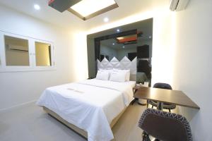 Letto o letti in una camera di HOTEL ViA