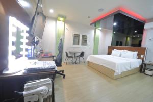 Letto o letti in una camera di HOTEL ViA