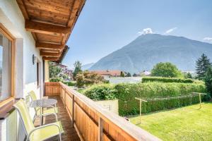 a balcony with a view of a mountain at Pension Weirather in Imst