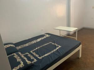 Een bed of bedden in een kamer bij KDorm