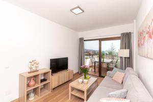 TV/trung tâm giải trí tại Iguazu TIR24 Top Floor Apartment