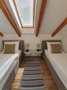 Katil atau katil-katil dalam bilik di River Houses Ljubljanica +39 gambar