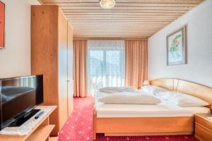 Voodi või voodid majutusasutuse Pension Weirather toas