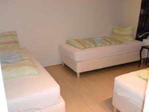 Ένα ή περισσότερα κρεβάτια σε δωμάτιο στο Guesthouse Tilraun
