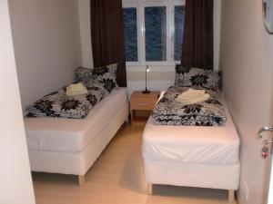 Ένα ή περισσότερα κρεβάτια σε δωμάτιο στο Guesthouse Tilraun
