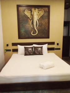 Voodi või voodid majutusasutuse Mihisara Resort toas