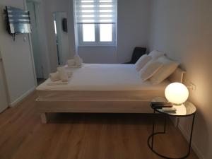 Posteľ alebo postele v izbe v ubytovaní Marina Rijeka Center apartments