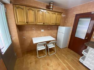 Kuchyňa alebo kuchynka v ubytovaní Apartamento céntrico con vistas y cerca de playa