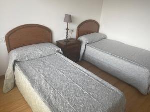 Posteľ alebo postele v izbe v ubytovaní Apartamento céntrico con vistas y cerca de playa