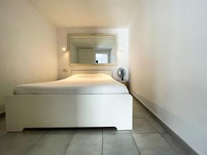 Posteľ alebo postele v izbe v ubytovaní Tossa Center Attic & Terrace