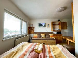 Postel nebo postele na pokoji v ubytování Guest House Privát Štrba