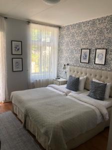 Katil atau katil-katil dalam bilik di Nautic Hotell