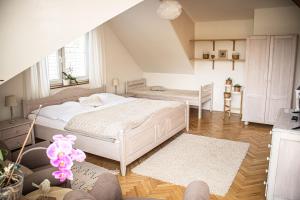Posteľ alebo postele v izbe v ubytovaní Apartmány u Petry